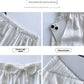 Womens high waist wide leg linen blend drawstring trousers, side view showing the wide leg drape to the ankle