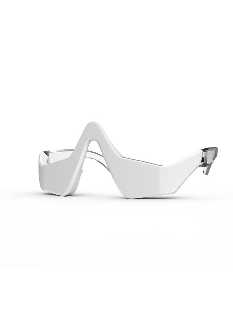 Eye Massager Instrument held against the brow during an evening relaxation routine
