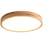 Round ultra-thin solid wood ceiling lamp with white acrylic panel glowing warm on a white background
