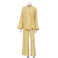 Tie-front top paired with the matching high-waisted trousers, full-length view