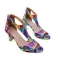 Pair of multicolor print T-strap peep toe sandals with flared heels on a white background