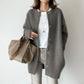 Knit cardigan styled in soft morning natural light over a tee and jeans
