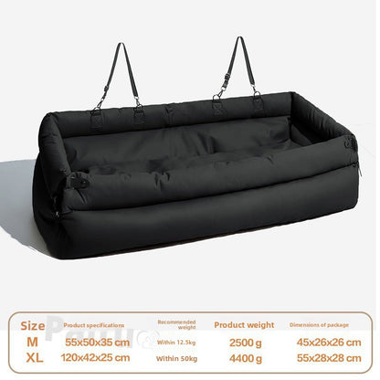 Green and orange dog car bolster bed in soft lighting showing the padded walls