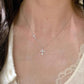 White tone double cross pendant necklace micro set with cubic zirconia on a cable chain