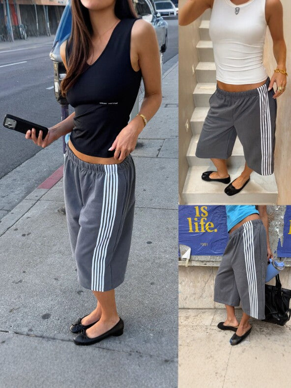 Woman in gray striped cropped pants and a black tank top on a sidewalk, with two small detail views beside her