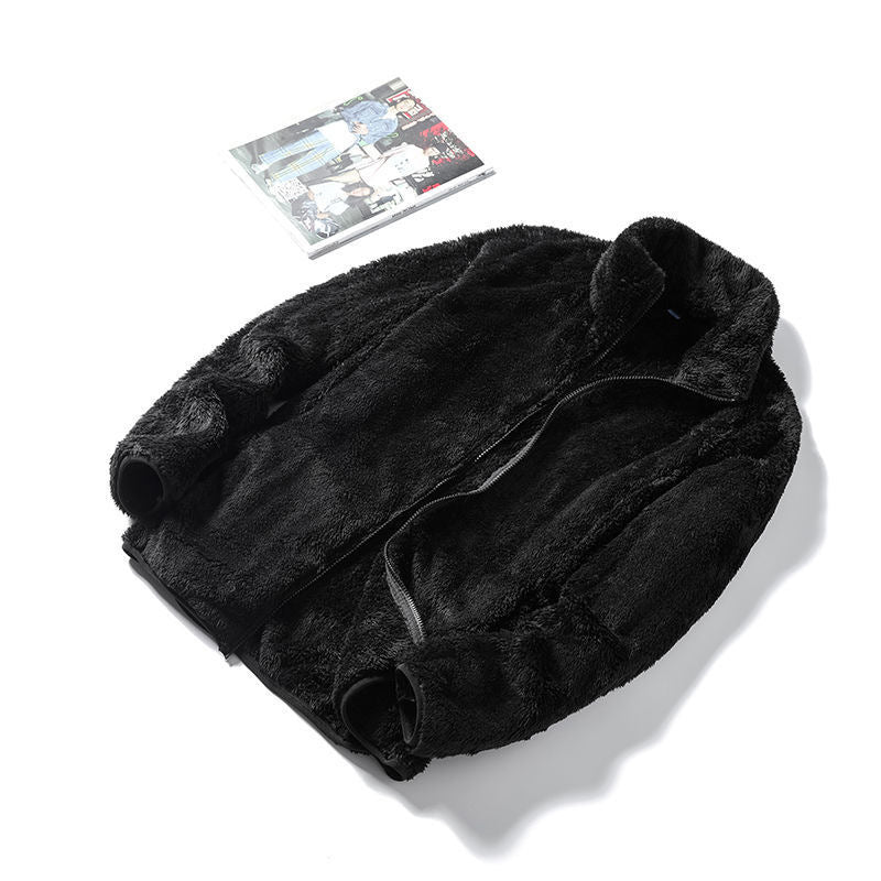 Loose fit plush fleece jacket with a full length zip and stand collar folded to show the nap