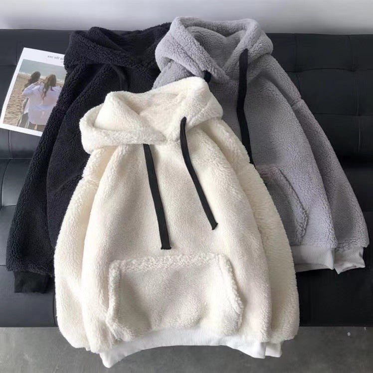 Women's black sherpa fleece pullover hoodie with drawstring hood and kangaroo pocket
