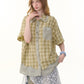 Green plaid doll collar shirt paired with trousers and a skirt