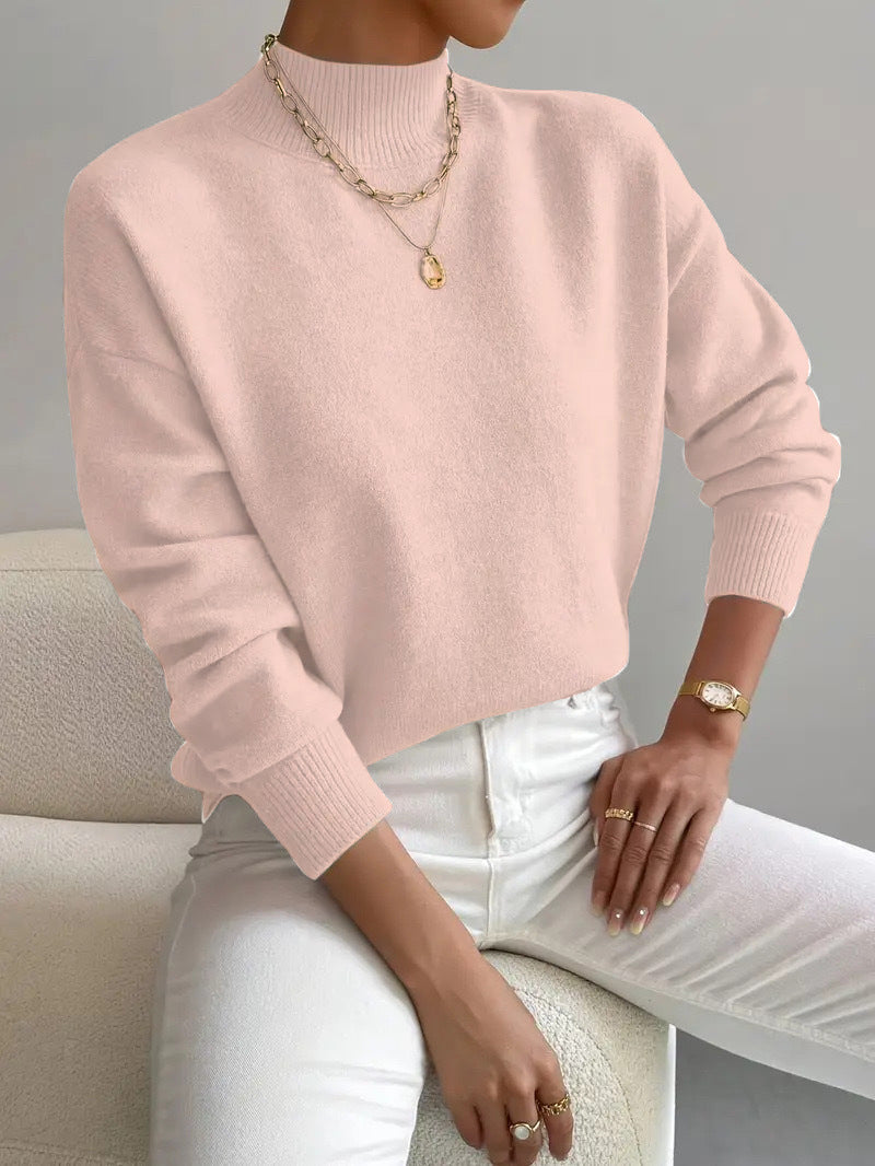 Blush Pink half-high neck pullover sweater with long sleeves worn with white trousers, size M variant image