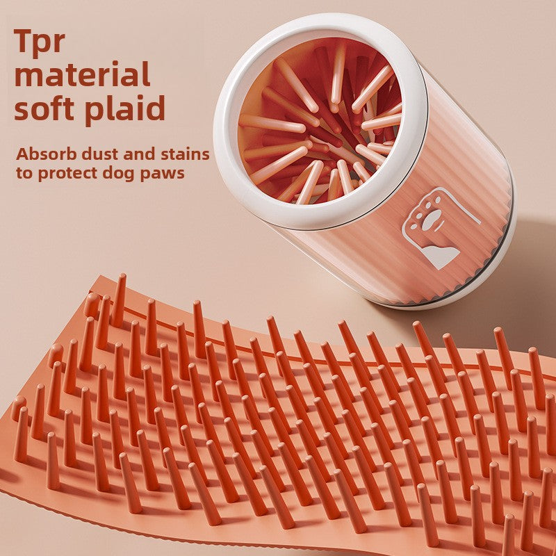 Maker panel showing the soft TPR bristle mat unrolled flat beside the orange pet paw wash cup