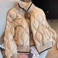 Cotton filled khaki quilted bomber jacket with a ribbed stand collar and full zip