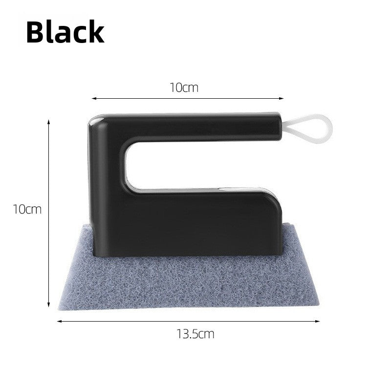 Handheld window and door track cleaning brush with fibre pad