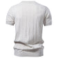 Close-up of the fine flat-gauge cotton knit texture and ribbed cuff detail