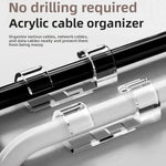 Clear acrylic self adhesive cable clips holding cables neatly along a surface