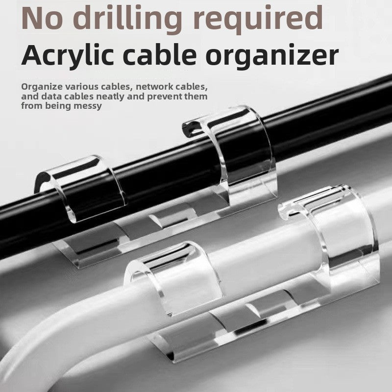 Clear acrylic self adhesive cable clips holding cables neatly along a surface