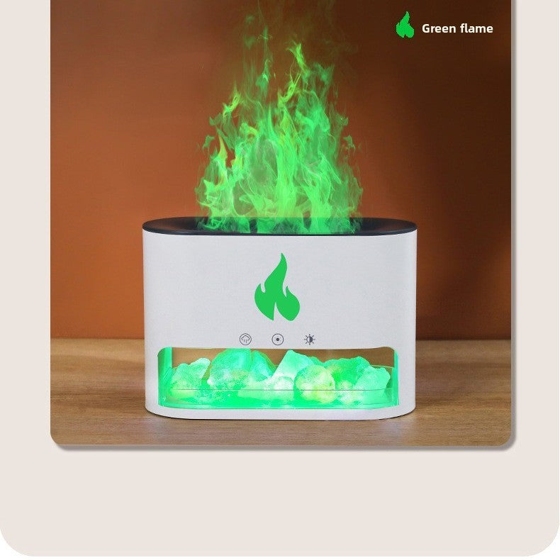 White flame effect aroma diffuser showing a green flame colour above the salt rock tray