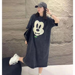 Washed grey cotton T-shirt dress with cream cartoon mouse face print, worn loose by model