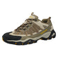 Suede and mesh hiking shoe worn outdoors on rocky ground with laces snugged