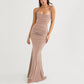 Detail of the sling straps and open back of the fishtail dress