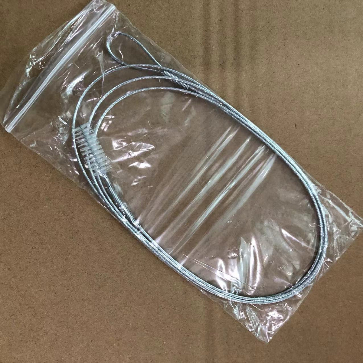 1m SteelBrush option: twisted steel wire brush in a clear bag on cardboard