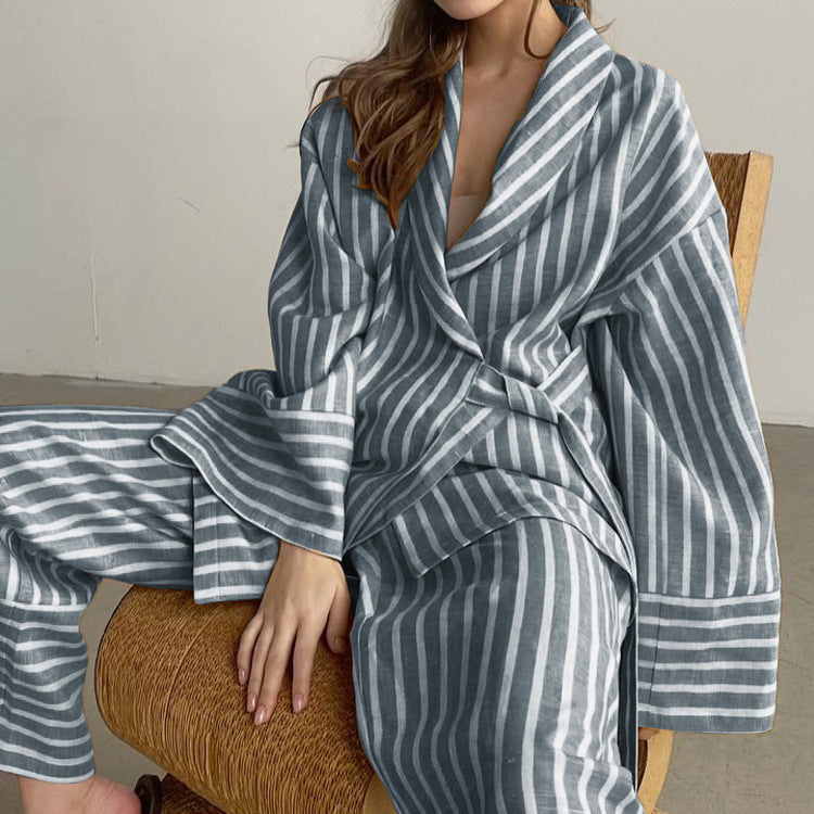 Angled view of the yellow two-piece tie-top and high-waisted trouser set