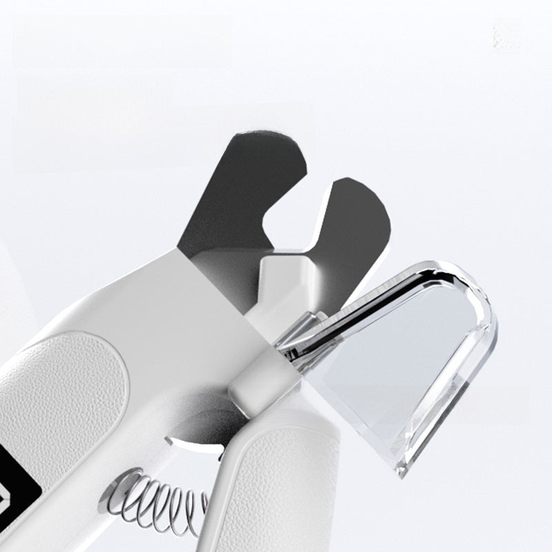 White pet nail clipper open blades with clear guard and coil spring shown in closeup