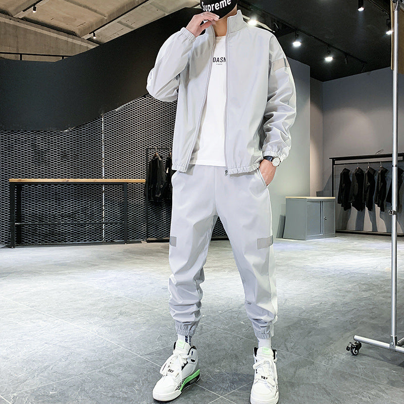 Green color-block hooded tracksuit set shown on a plain background