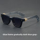 Square sunglasses folded showing the broad temple arms and gold arrowhead detail