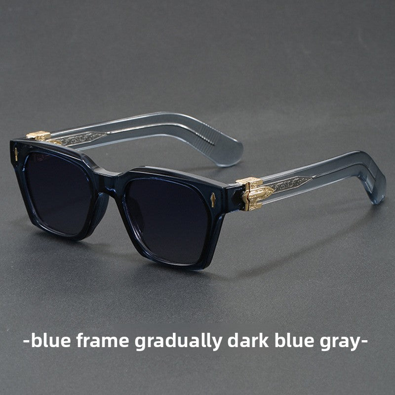 Square sunglasses folded showing the broad temple arms and gold arrowhead detail