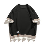 Close-up of the soft jersey knit fabric texture on the round neck tee