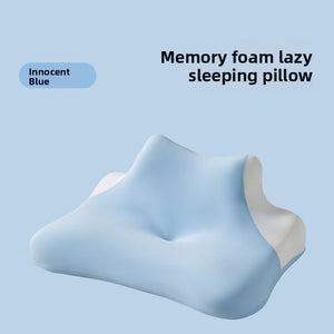 Blue contour memory foam pillow with a dipped centre and raised side wings on a plain background