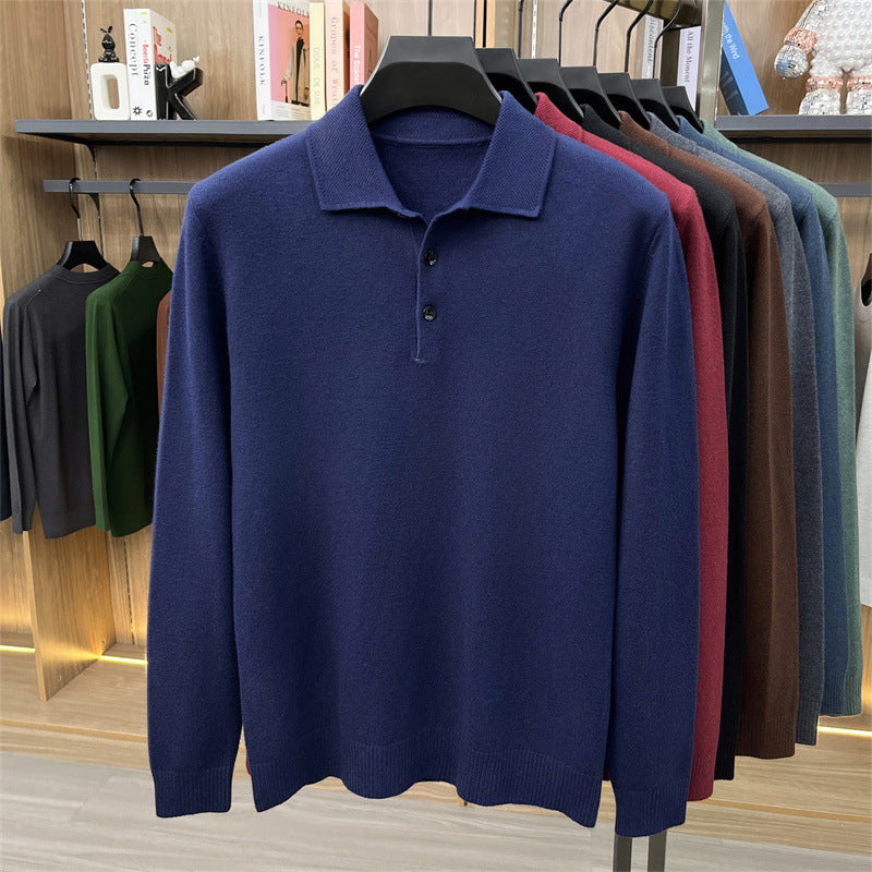 Navy Blue long sleeve knit polo shirt with three button placket and ribbed hem, size L