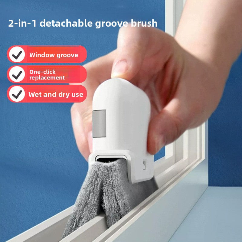 Hand using the white window groove brush along a window frame with the microfiber pad in the track