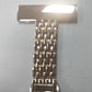 Nurse fob watch shown pinned by its brooch bar to display how it hangs