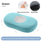 Green oval memory foam pillow with breathable mesh center panel and marked dimensions