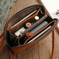 Retro Leather Women's Shoulder Bag | scale reference with hand