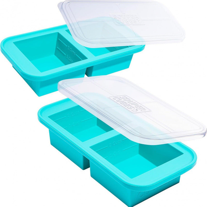 Flexible platinum silicone ice cube tray shown stacked in a freezer for frozen broth and baby food