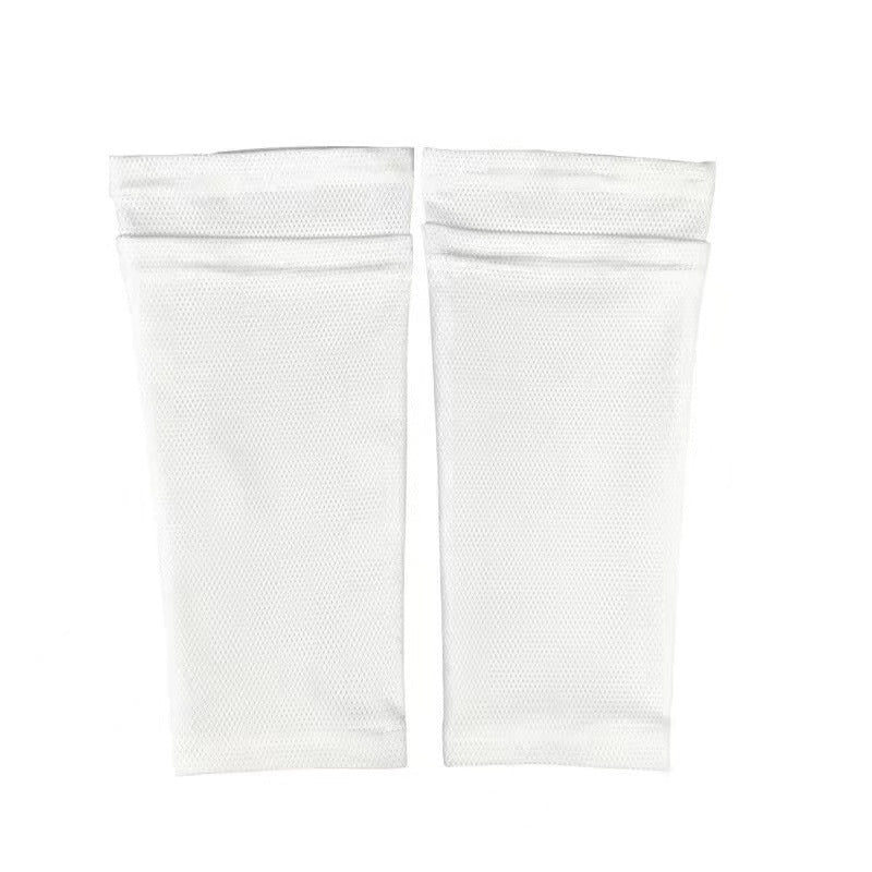 Pair of white double layer soccer shin guard sleeves laid flat on a white background