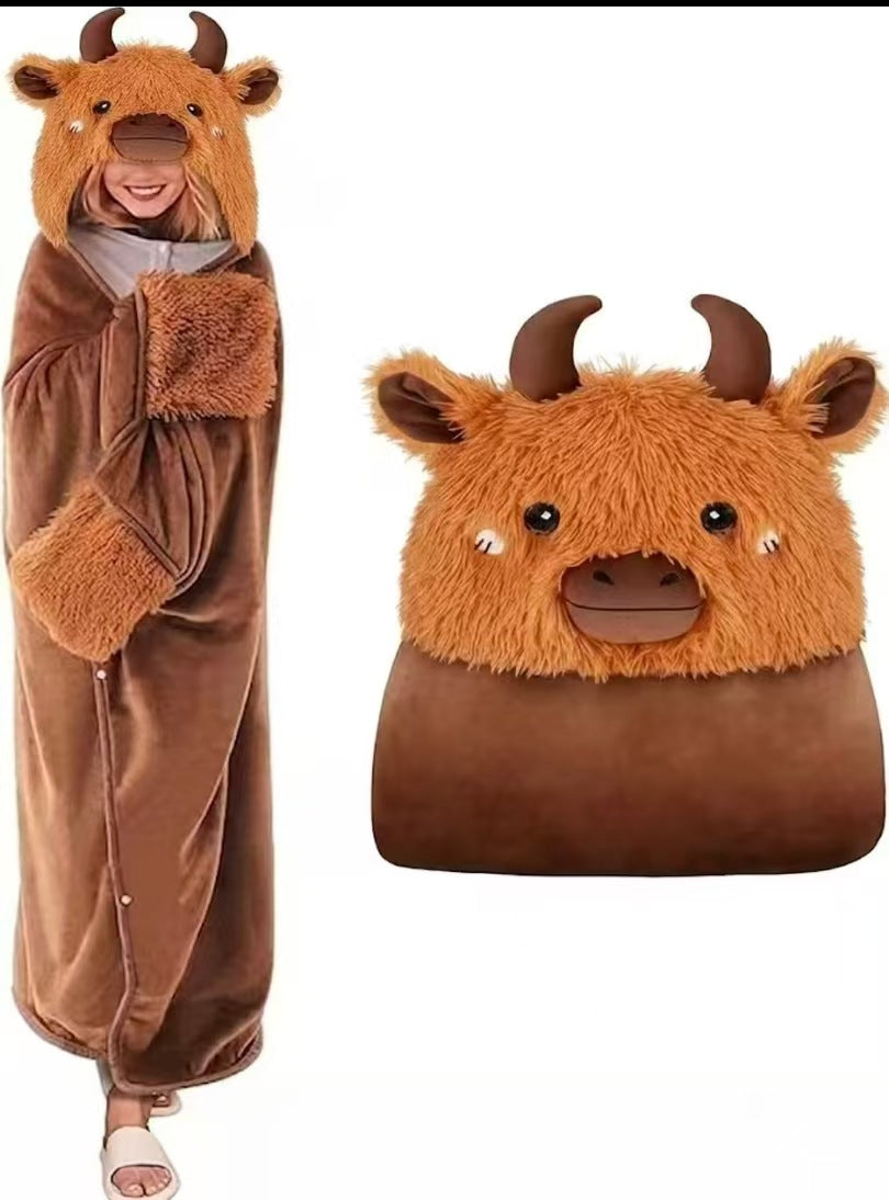 Hooded animal cape blanket shown worn over the shoulders with the hood up