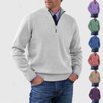 Mens acrylic knit quarter zip mock neck pullover sweater shown in several colours on a standing model