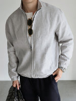 Men's linen stand collar jacket in Capri Blue, full front view with the zip closed