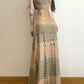 Front view of the khaki printed soft-drape women's casual dress