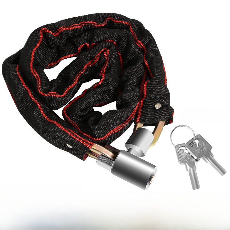 Bicycle chain lock looped through a wheel and frame next to a parked bike