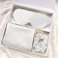 Silk gift set photographed in soft natural light styling