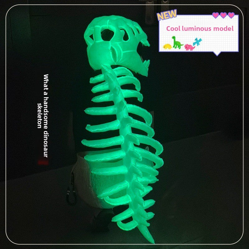 Glowing dinosaur skull and spine costume seen head to tail in a dark setting on a standing wearer
