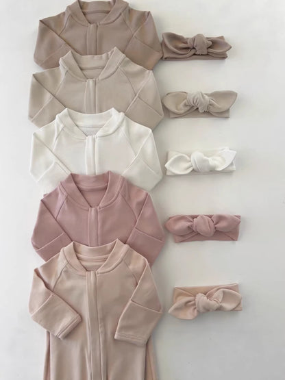 Five zip baby rompers in taupe, cream, white, mauve and blush with knot headbands, headbands not included