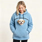 Sky blue teddy fleece hoodie with a small dog's head looking out of the chest opening above the front pocket