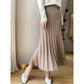 Side view of the ribbed wool midi skirt showing the A line swing