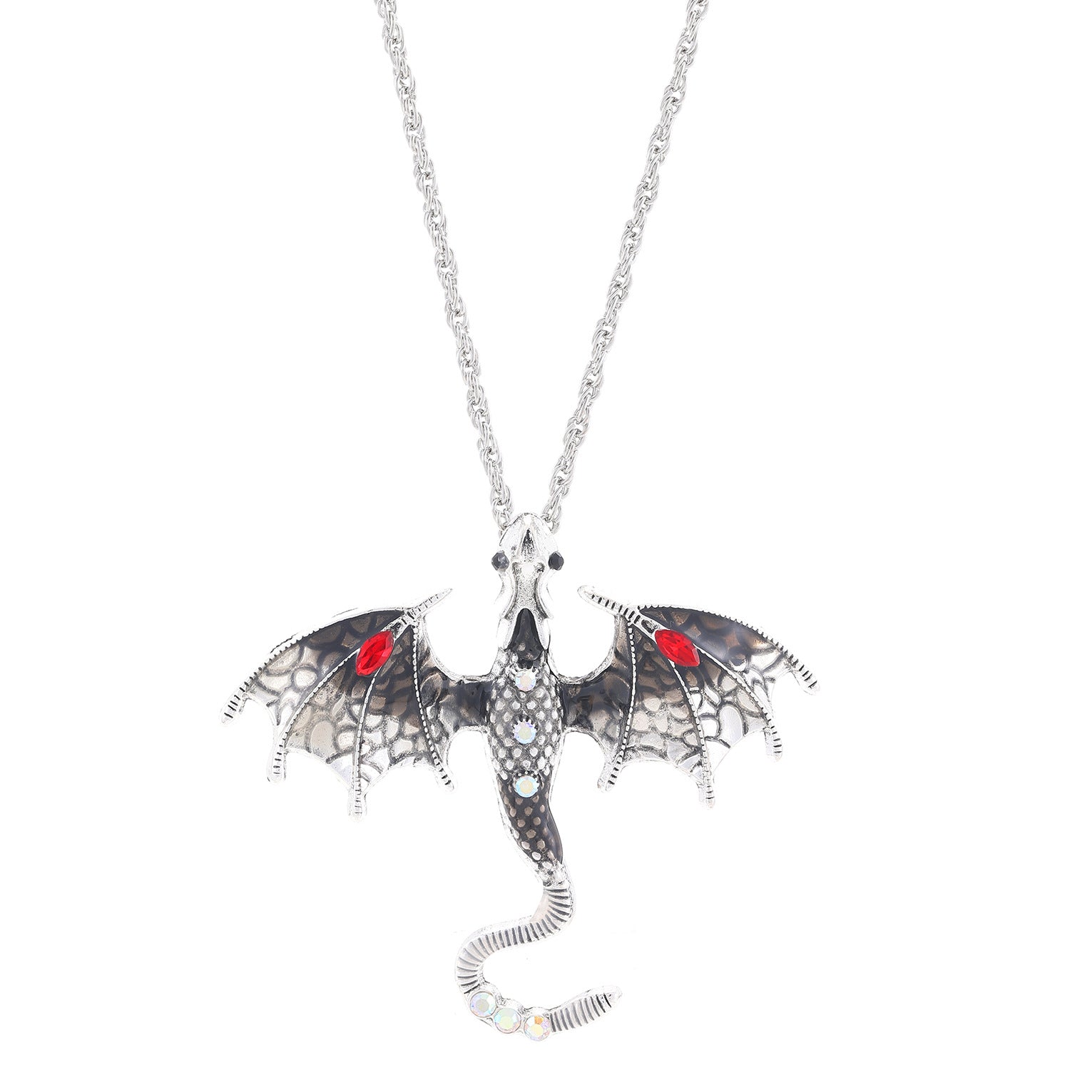 Top down view of the dragon pendant and slim link chain laid flat