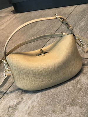 Genuine leather crossbody bucket bag front view with lock closure